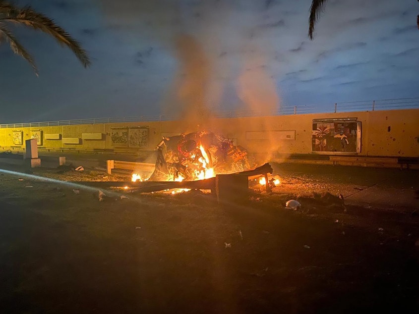 caption: A vehicle hit by a missile burns outside the Baghdad International Airport, where U.S. airstrikes killed Qassem Soleimani, the head of Iran's elite Quds Force, at the direction of President Trump.