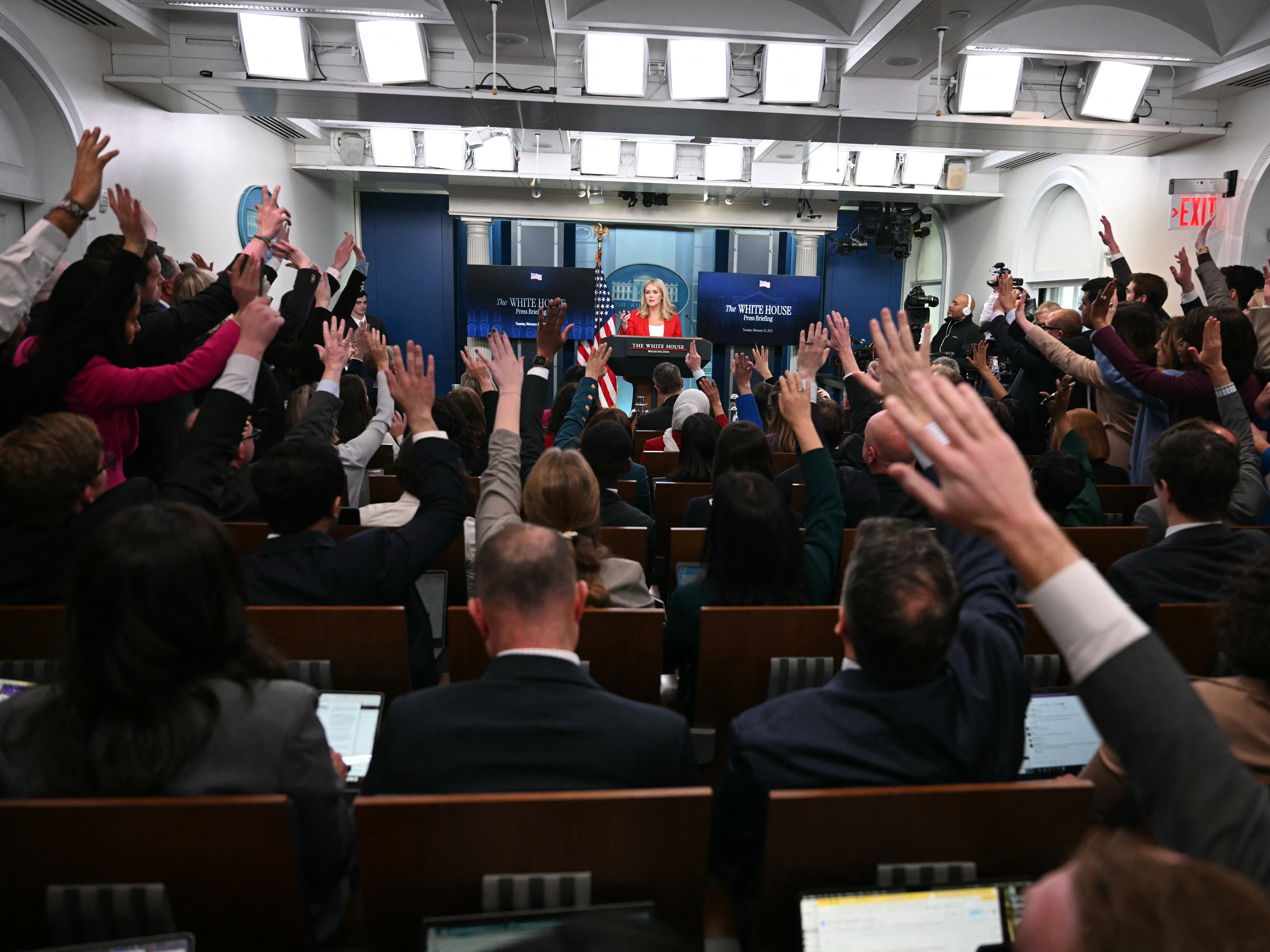 caption: White House press secretary Karoline Leavitt takes questions during the daily briefing in the Brady Briefing Room of the White House on Feb. 25, 2025.