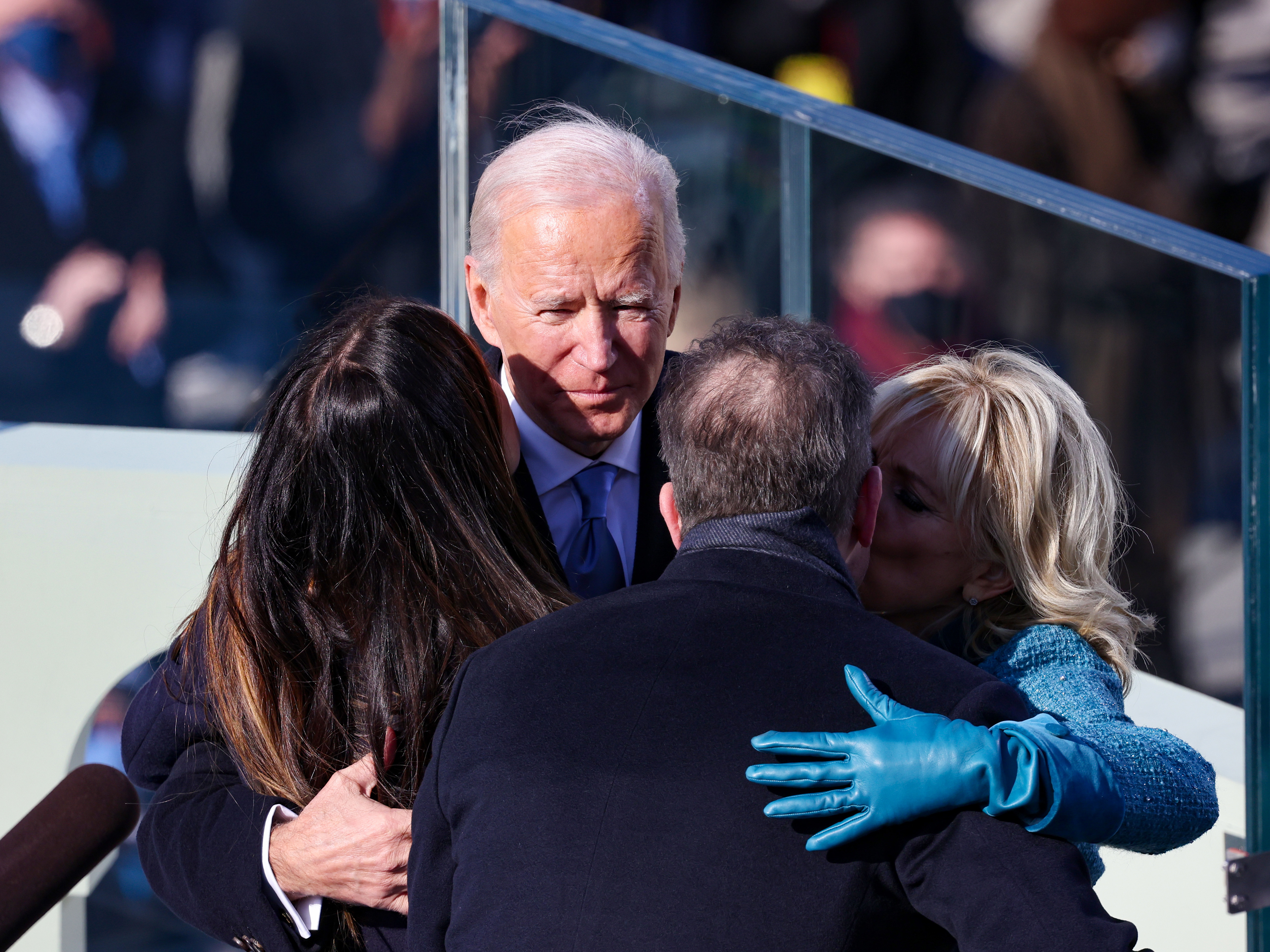 caption: President Biden and first lady Jill Biden hug Hunter Biden and daughter Ashley Biden after being sworn in as U.S. president.