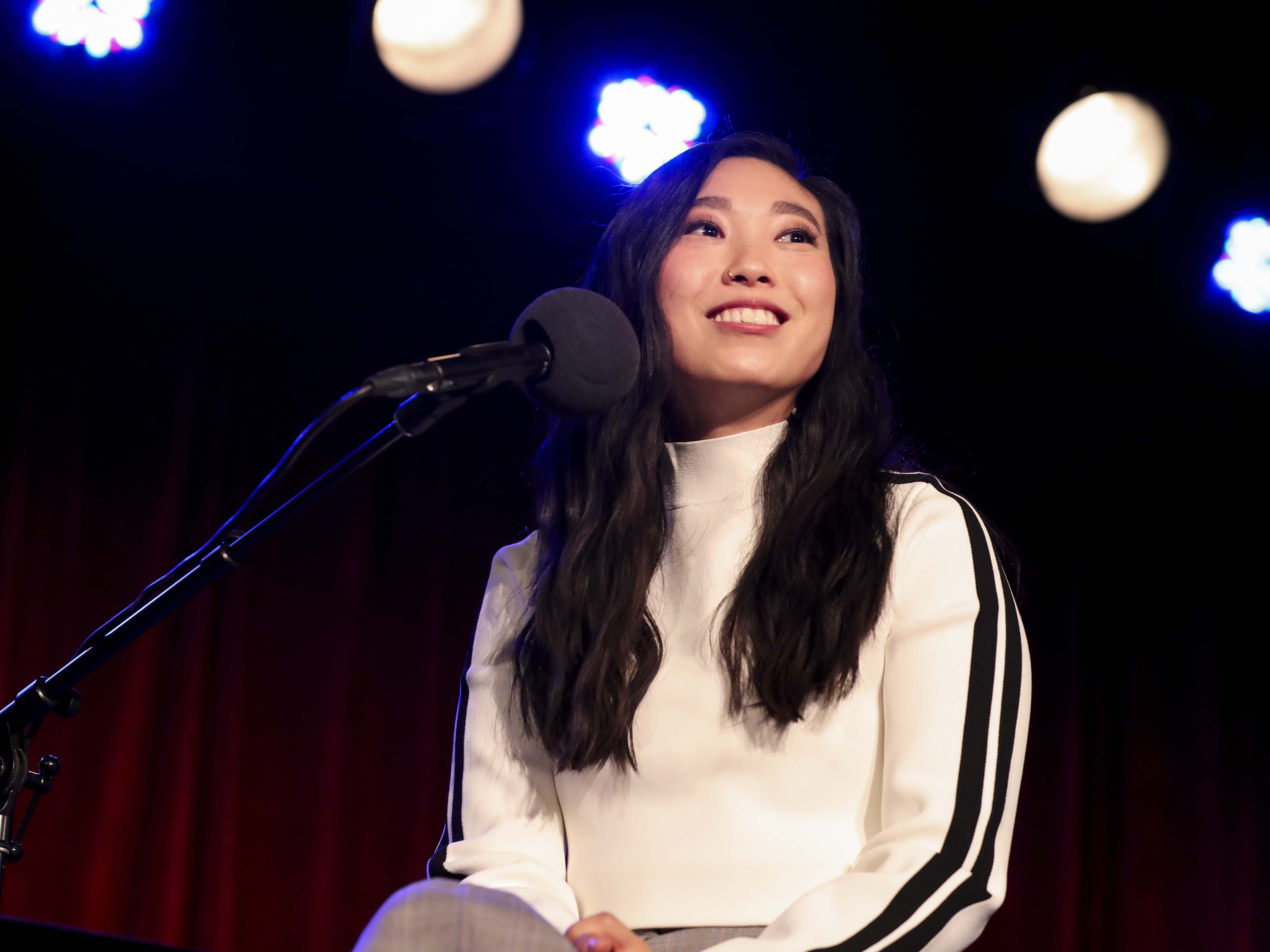 caption: Awkwafina appears on Ask Me Another at the Bell House in Brooklyn, New York.