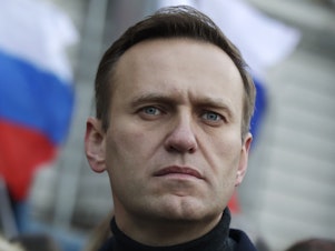 caption: Russian opposition leader Alexei Navalny takes part in a march in Moscow on Feb. 29, 2020. Associates say he has been located at a prison colony above the Arctic Circle nearly three weeks after contact with him was lost.
