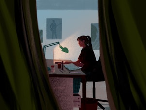 A young student attends online school from her bedroom.