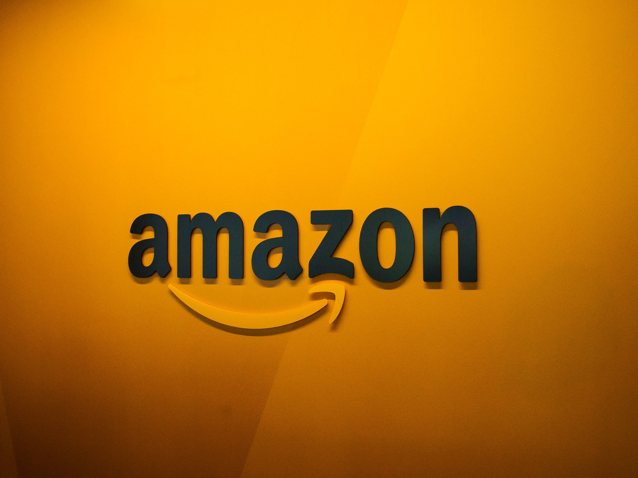 caption: Splitting Amazon's second headquarters between two locations would dilute the company's original promise of a megadeal, but it could also relieve Amazon of being blamed for worsening traffic and increased housing prices.