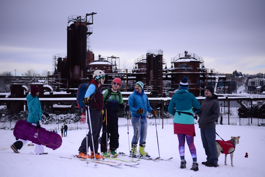 caption: Skiing and snowboarding at Gas Works Park in Seattle on Saturday, Feb. 10, 2019, after the city was hit with six to eight inches of snow.