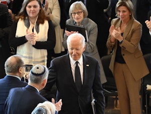 caption: President Biden arrives to speak at the annual Days of Remembrance ceremony at the U.S. Capitol on May 7.