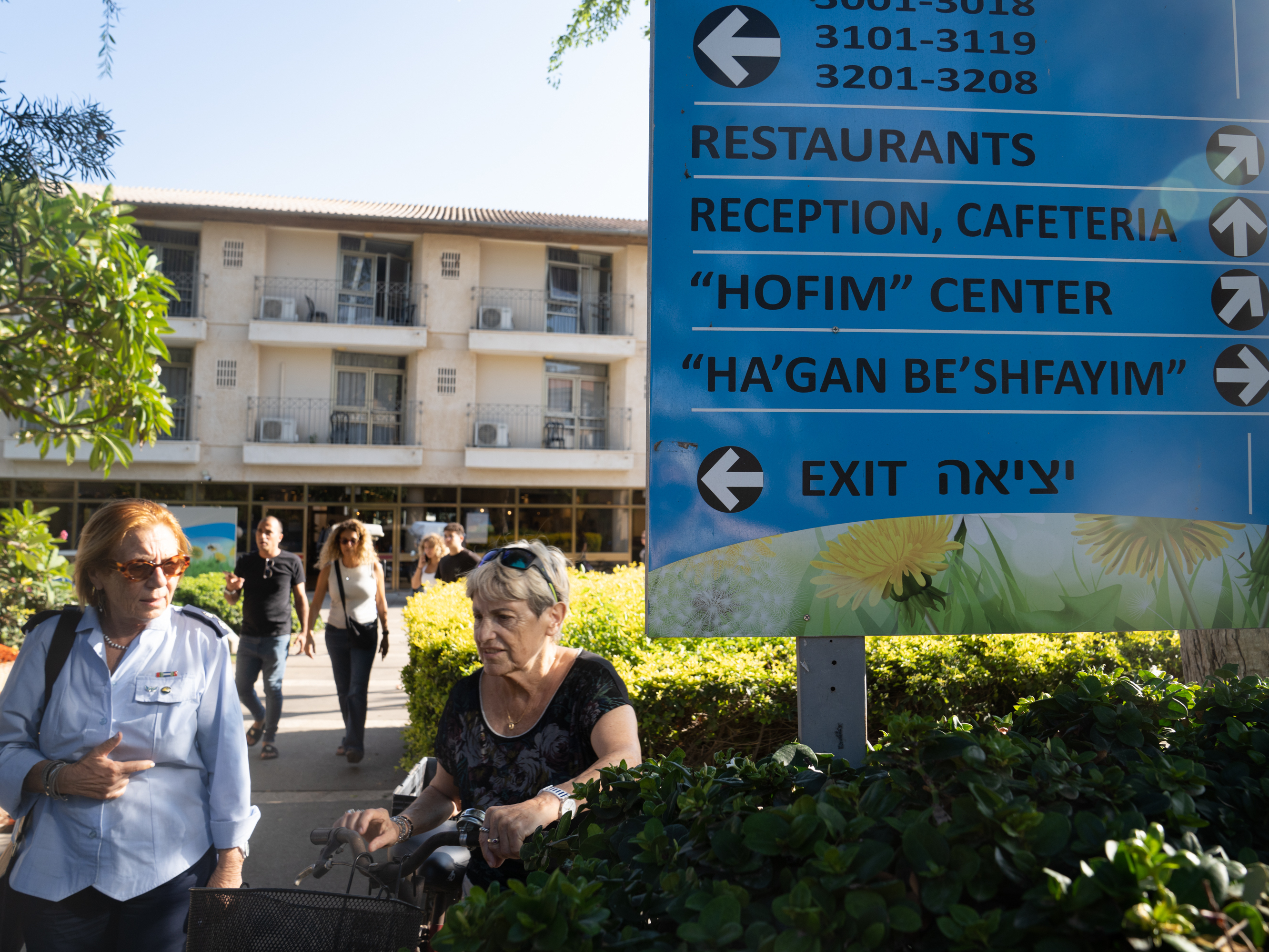 caption: Shefayim Hotel, just north of Tel Aviv, is hosting hundreds of survivors of Kibbutz Kfar Aza, a community that suffered some of the most catastrophic losses in the Hamas attacks two weeks ago.