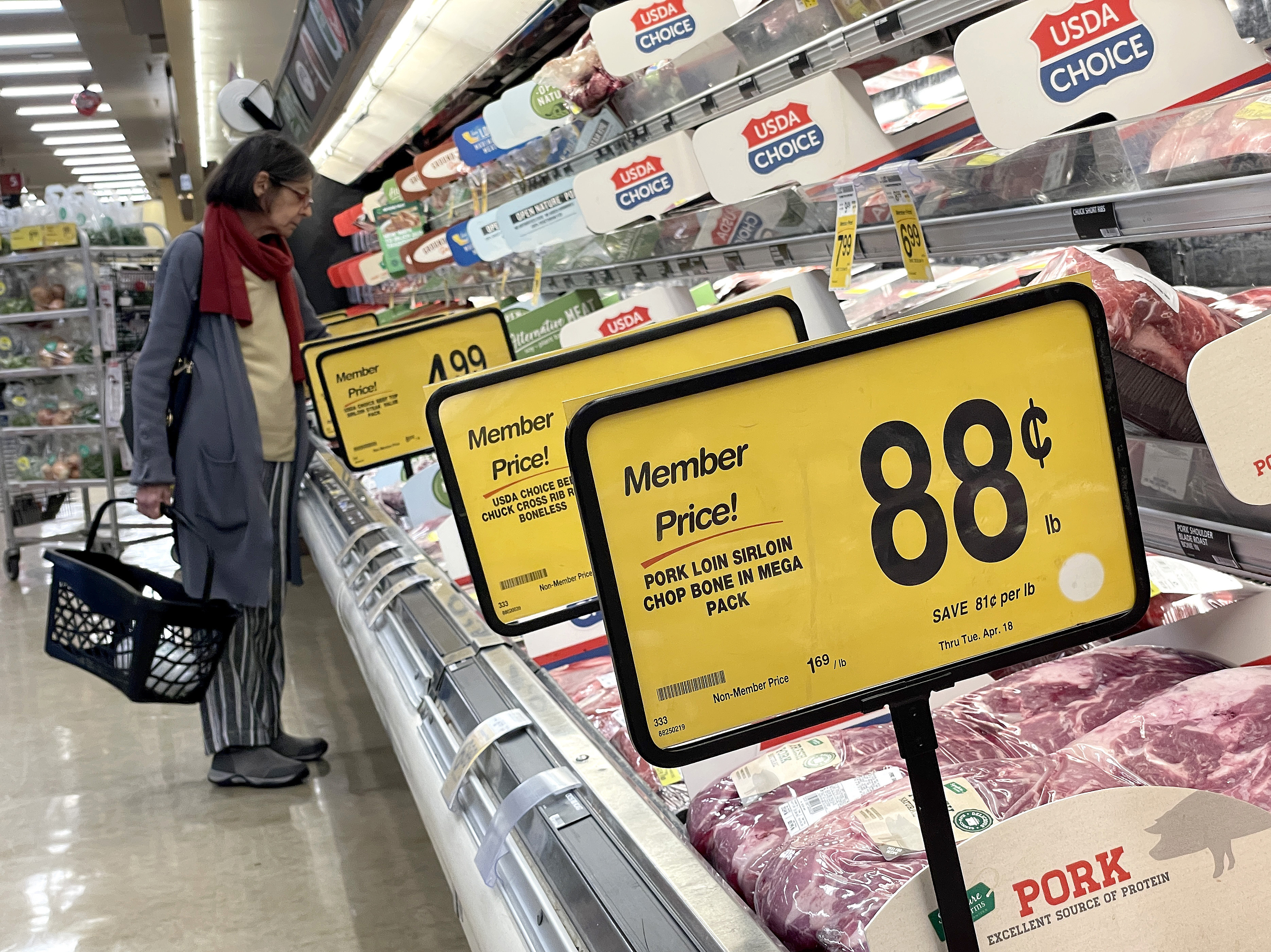 caption: A customer shops for meat at a Safeway store in San Rafael, Calif., on April 12, 2023. Consumer prices eased slightly in April from the previous month but are still too high for the Fed's comfort.