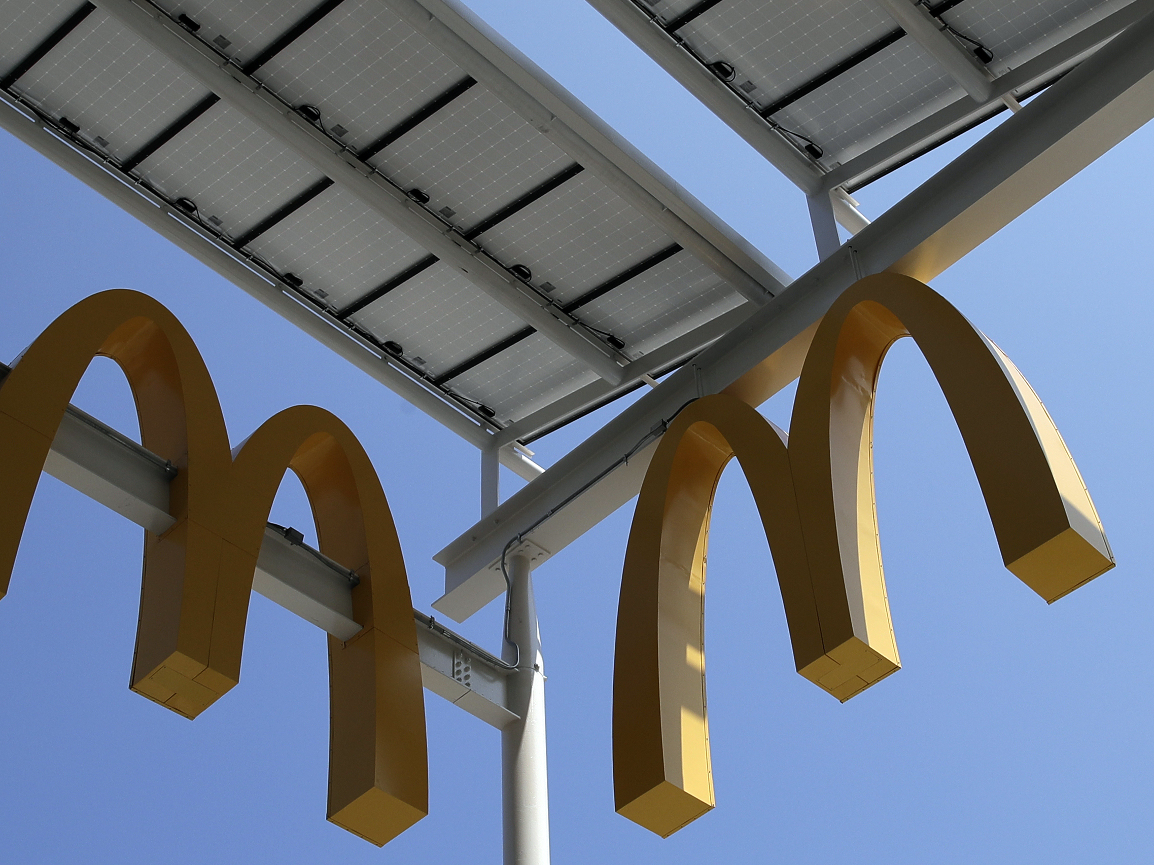 caption: A lawsuit by 17 McDonald's workers accuses the fast-food chain of "undermining safety" with late-night work, store design changes and inadequate training.