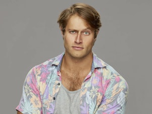 caption: Luke Valentine was removed from CBS' Big Brother after using a racial slur in conversation.