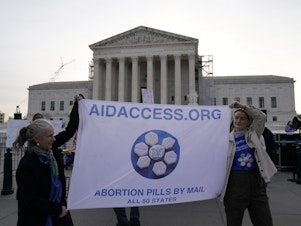 caption: Abortion rights activists at the Supreme Court in Washington, D.C. on March 26, the day the case about the abortion drug mifepristone was heard. The number of abortions in the U.S. increased, a study says, surprising researchers.