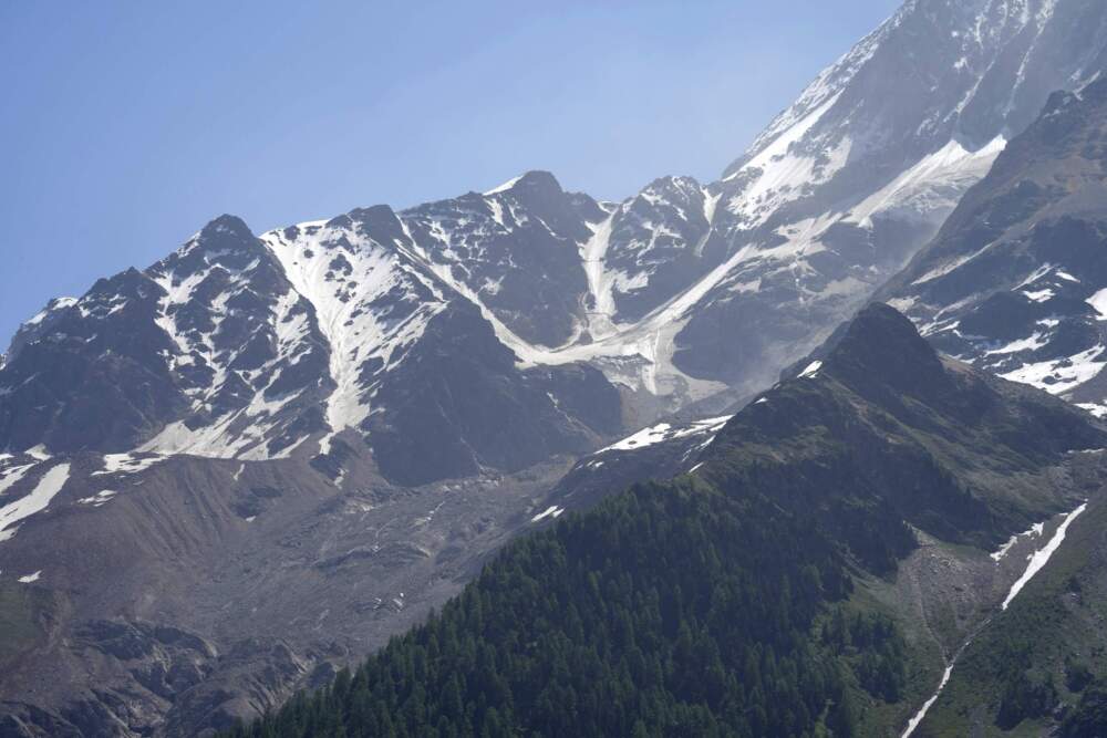 caption: The aftermath of the Birch Glacier collapse is visible in Blatten, Switzerland, June 11, 2025. (Matthias Schrader/AP)