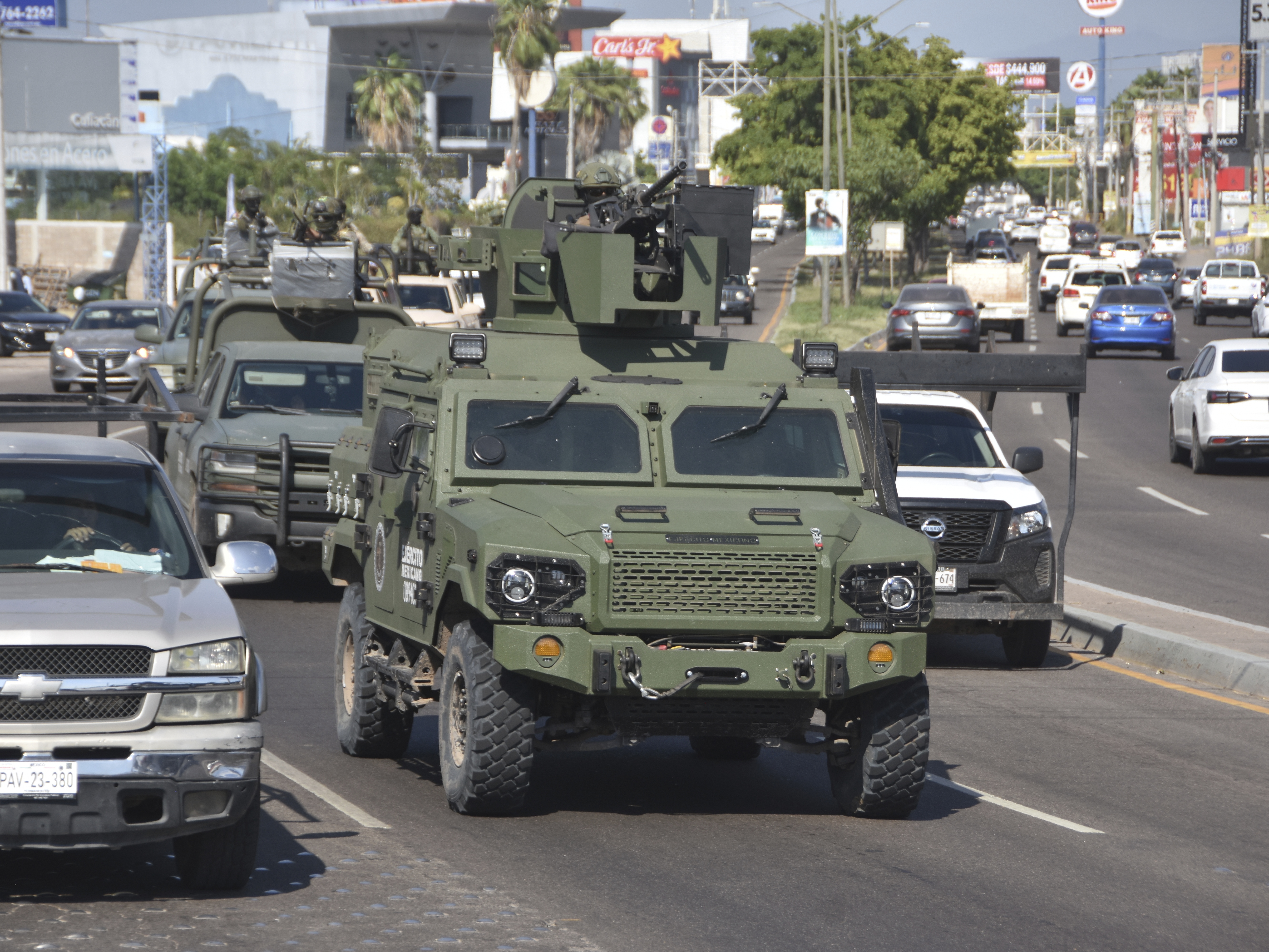 caption: National Guards patrol the streets in Culiacan, Sinaloa state, Mexico in October 2024