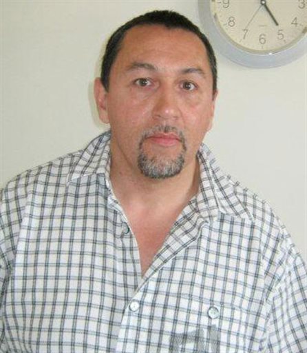 caption: Michael Sean Stanley, described by police as a violent sex offender, has been tracked to downtown Seattle.