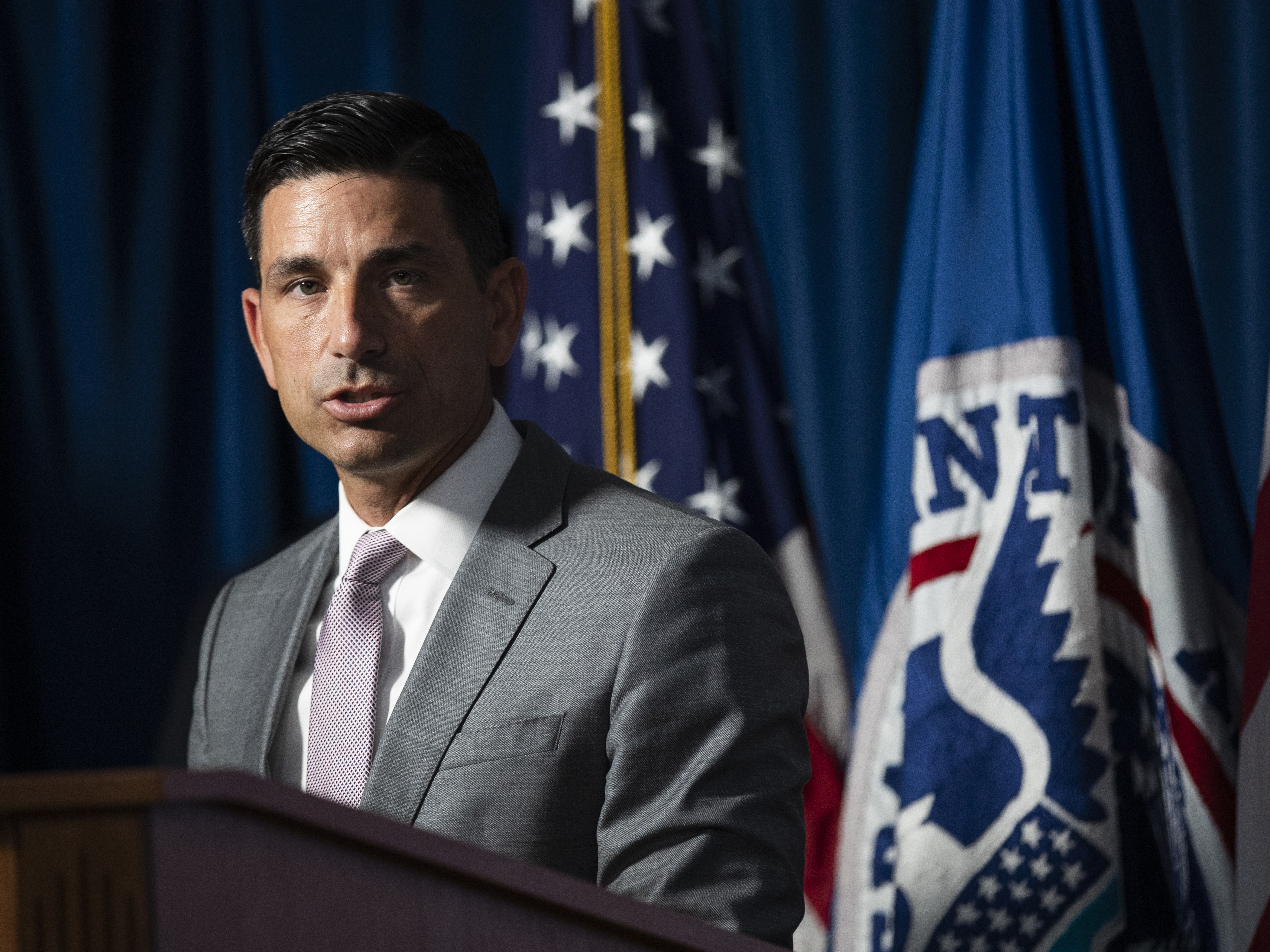 caption: Department of Homeland Security Acting Secretary Chad Wolf speaks during a news conference to address the situation in Portland, Ore., on Tuesday, in Washington.
