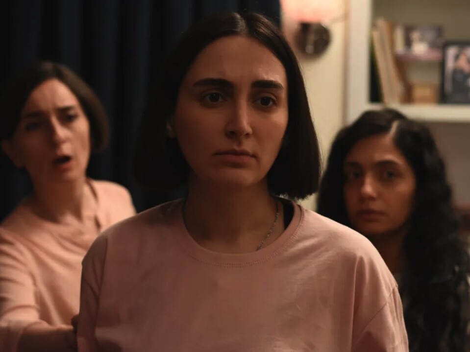 caption: When one of her friends is injured at a rally, Rezvan (Mahsa Rostami, center) becomes increasingly supportive of the movement challenging Iran's authoritarian regime.