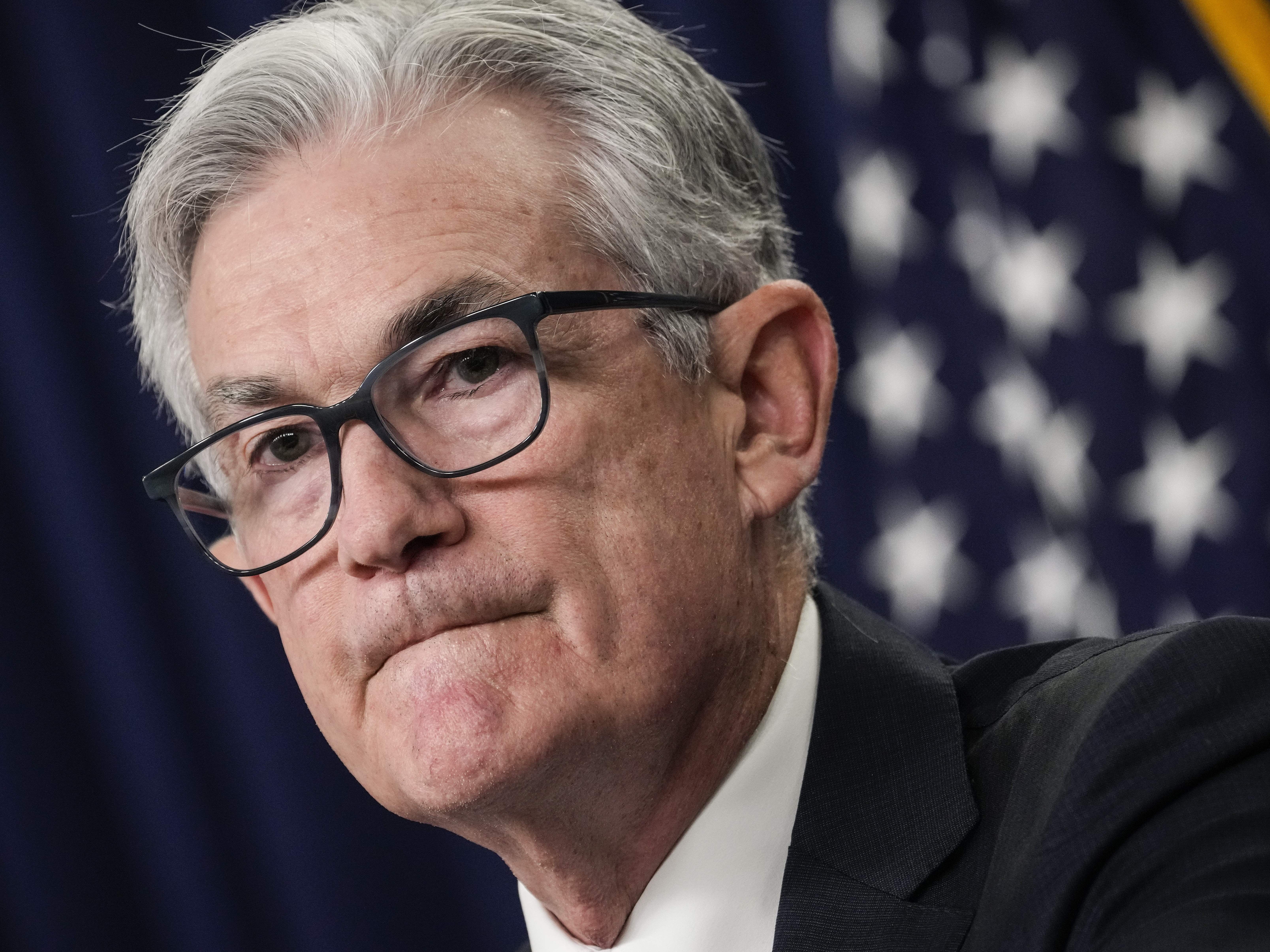 caption: Federal Reserve Chair Jerome Powell speaks during a news conference following a Fed policy meeting in Washington, D.C., on July 27. Powell warned on Friday the central bank is committed to bring down inflation even if it causes some economic pain.