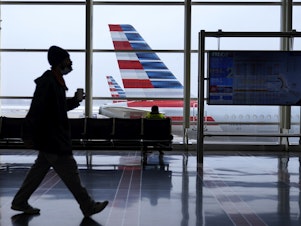 caption: The airline industry is struggling to keep up with spiked demand for air travel.