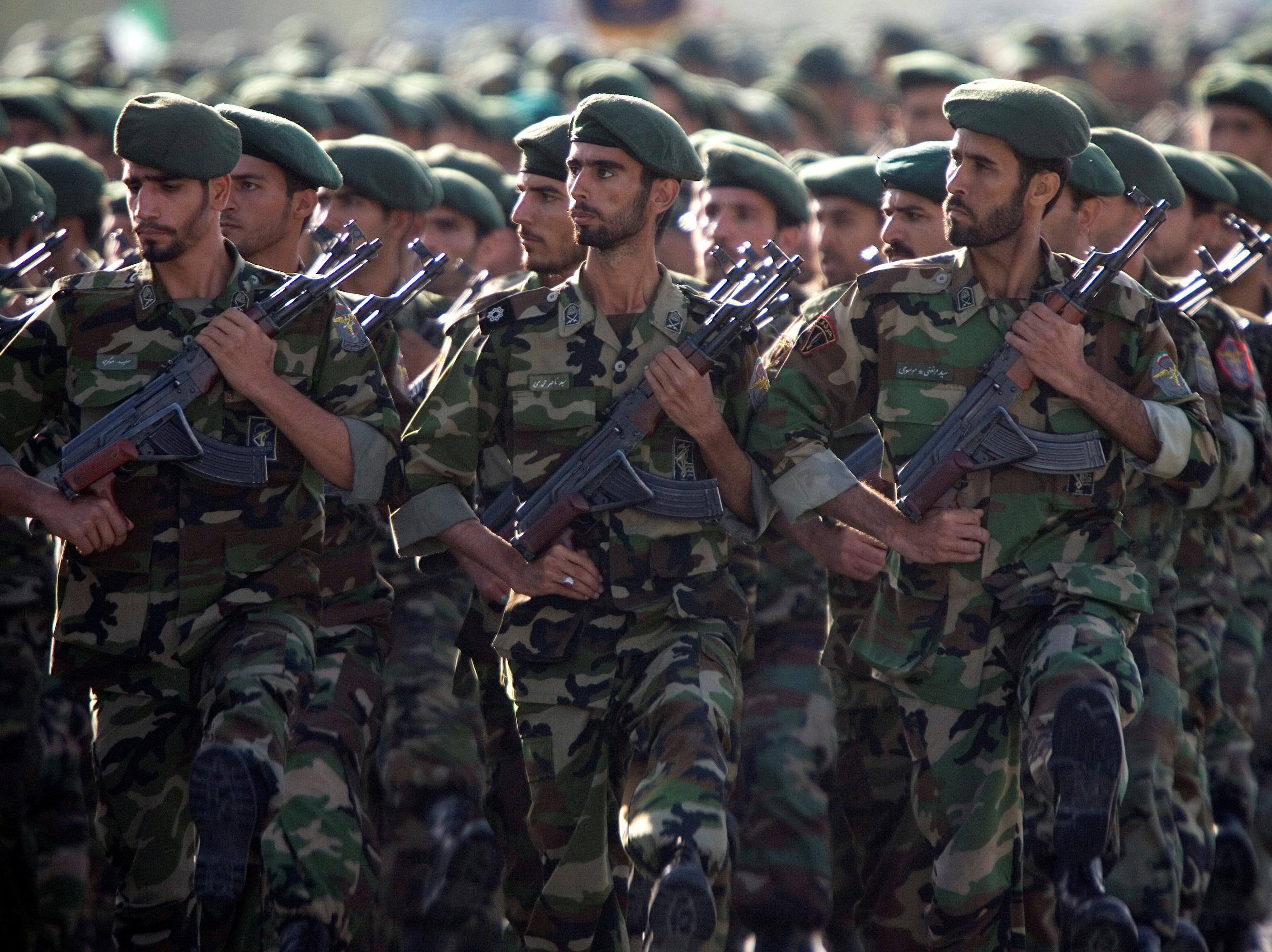 caption: The U.S. has designated Iran's Revolutionary Guard Corps as a terrorist group. Here, members of the force march during a 2007 military parade in Tehran.