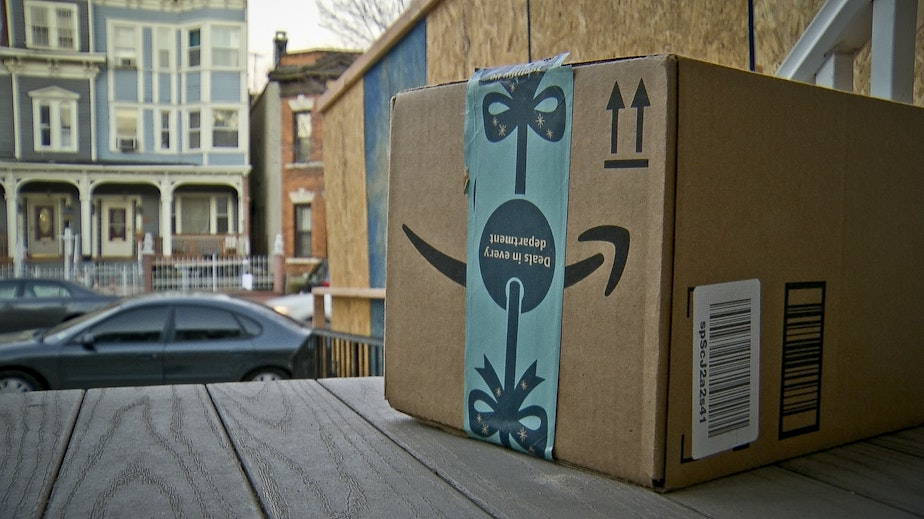 caption: This image taken from video shows an Amazon package containing a GPS tracker on the porch of a Jersey City, N.J. residence after its delivery Tuesday, Dec. 11, 2018. The explosion in online shopping has led to porch pirates and stoop surfers swiping holiday packages from unsuspecting residents. The cops in one New Jersey city are trying to catch the thieves with some trickery of their own.