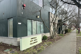 caption: Community Passageways headquarters are located in a building owned by Emerald City Bible Fellowship, where the 2021 shooting took place.