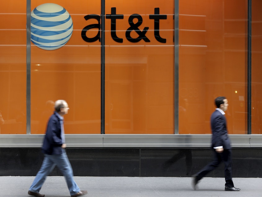 caption: An AT&T store in New York. The telecommunications company said Saturday that a data breach has compromised the information tied to 7.6 million current customers.