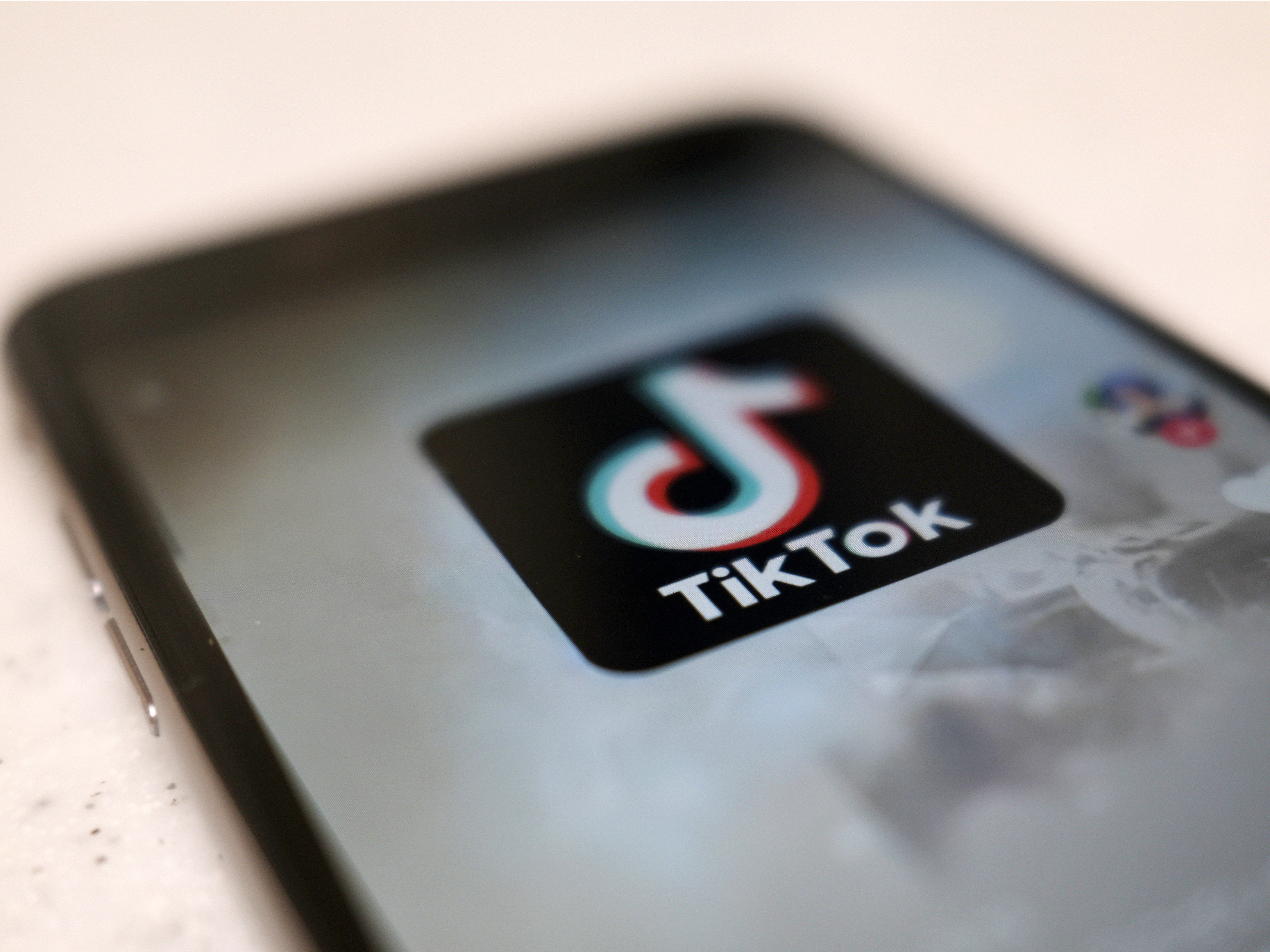 caption: A hand signal popularized on TikTok led authorities to rescue an underage girl.