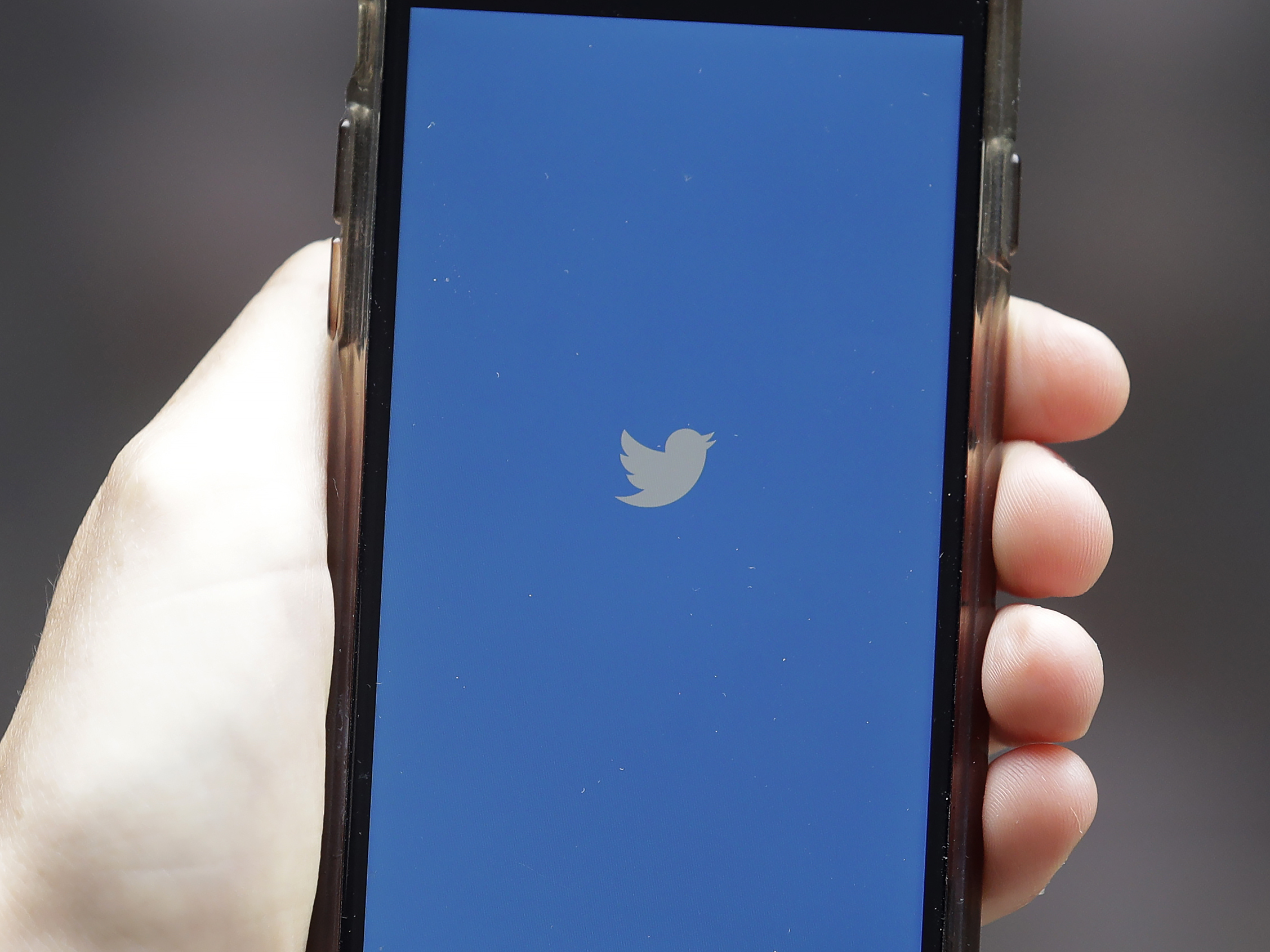 caption: Twitter on Tuesday said it is taking sweeping action against the conspiracy theory QAnon, removing more than 7,000 accounts associated with the group and banning links related to QAnon on the platform.