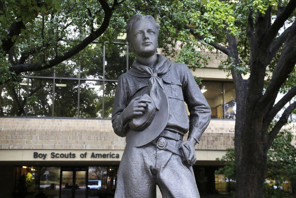 caption: A statue stands outside the Boys Scouts of America headquarters in Irving, Texas. (AP Photo/LM Otero)