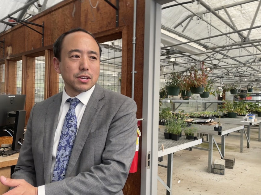 caption: Bellevue's new school superintendent, Kelly Aramaki, shares his vision to bring joy back to schools as he showed off Interlake High School's greenhouse in May.