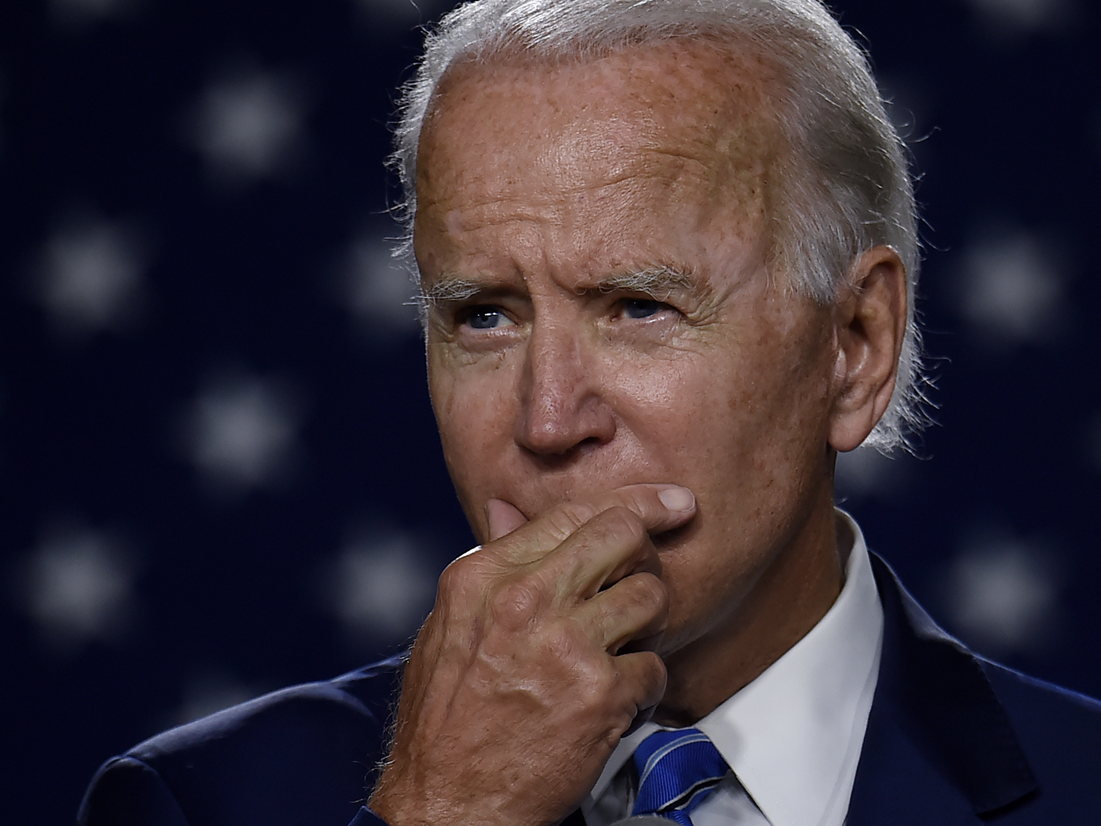 caption: Then presidential candidate Joe Biden speaks at a "Build Back Better" Clean Energy event on July 14, 2020. On Thursday, Biden unveiled an ambitious economic plan just days before he's set to be inaugurated as president.