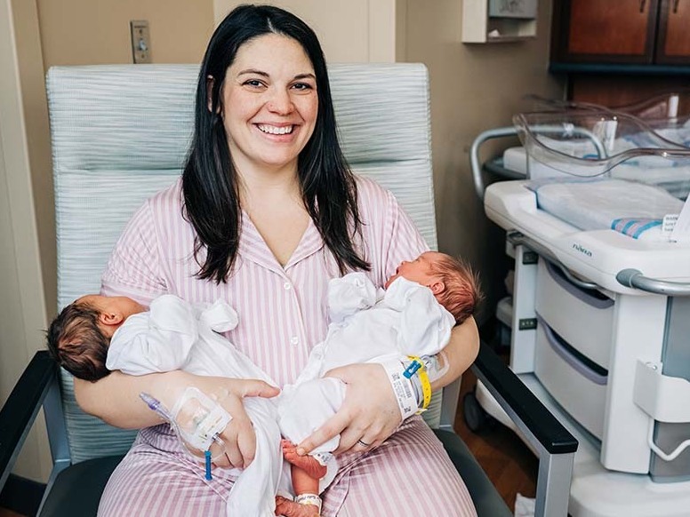 caption: Kelsey Hatcher, 32, delivered twins, Roxi and Rebel, on Dec. 19 and 20, in what's known as a dicavitary pregnancy delivery.
