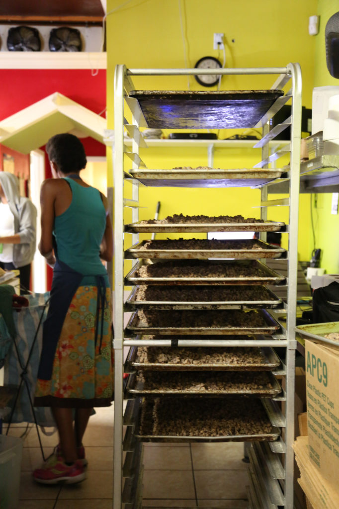 caption: A rack full of cooked black-eye peas gets ready to be turned into tubs of Kristi Brown's popular hummus. The peas are blended with olive oil, garlic, tahini, lemon juice, hot pepper sauce, salt and spices to make That Brown Girl Cooks! signature hummus.