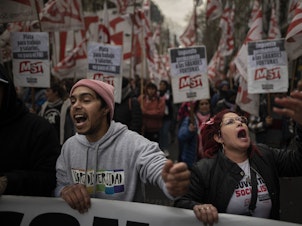 caption: Large numbers of workers from different sectors protest against inflation and in favor of higher wages in Buenos Aires, Argentina, on Aug. 17, where inflation has soared.