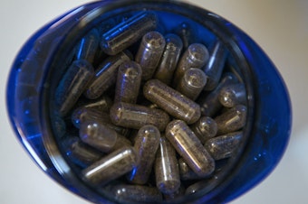 caption: Placenta purveyors often dehydrate and grind a new mother's placenta to a powder, then add it to a pill capsule. Generally, the goal is to increase her milk production, energy and mood, but scientists dispute such benefits.