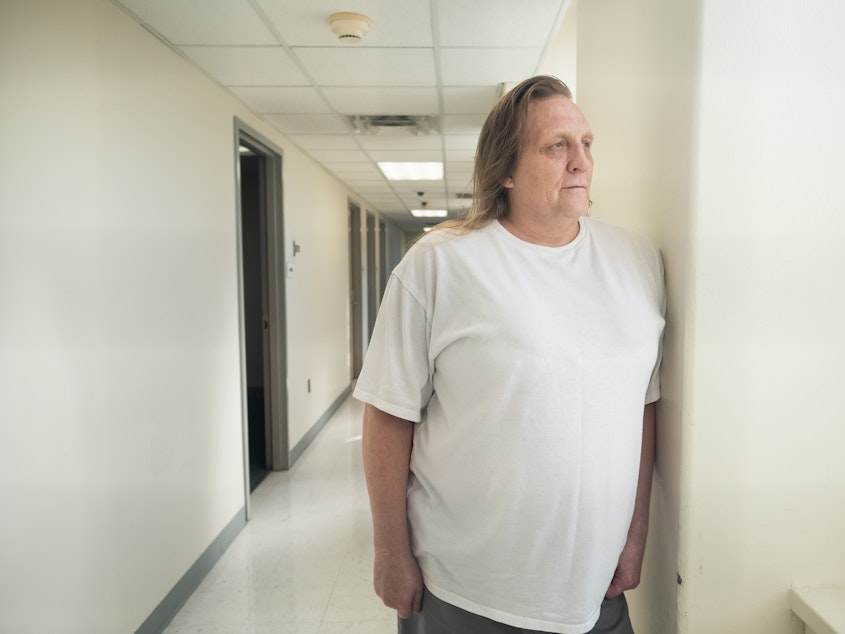 caption: Christina Lusk, a transgender woman and inmate at Minnesota Correctional Facility-Moose Lake, poses for a portrait on Sept. 7, 2022. Lusk and the Minnesota Department of Corrections have settled her lawsuit, and she is set to move to a women's prison.