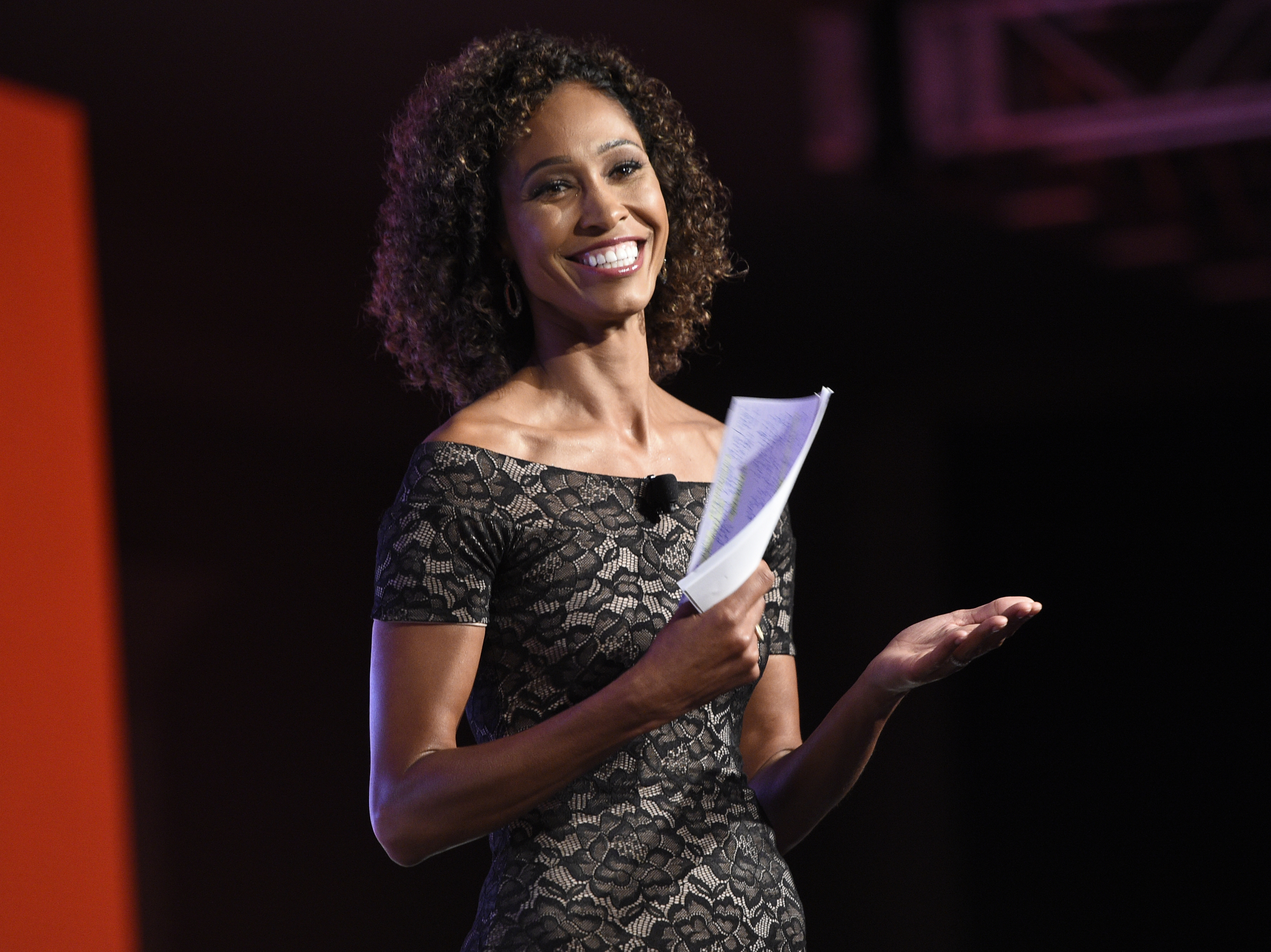 caption: On a podcast, ESPN anchor Sage Steele called vaccine mandates "sick" and "scary" and questioned why former President Barack Obama identifies as Black even though he was raised by his white mother.