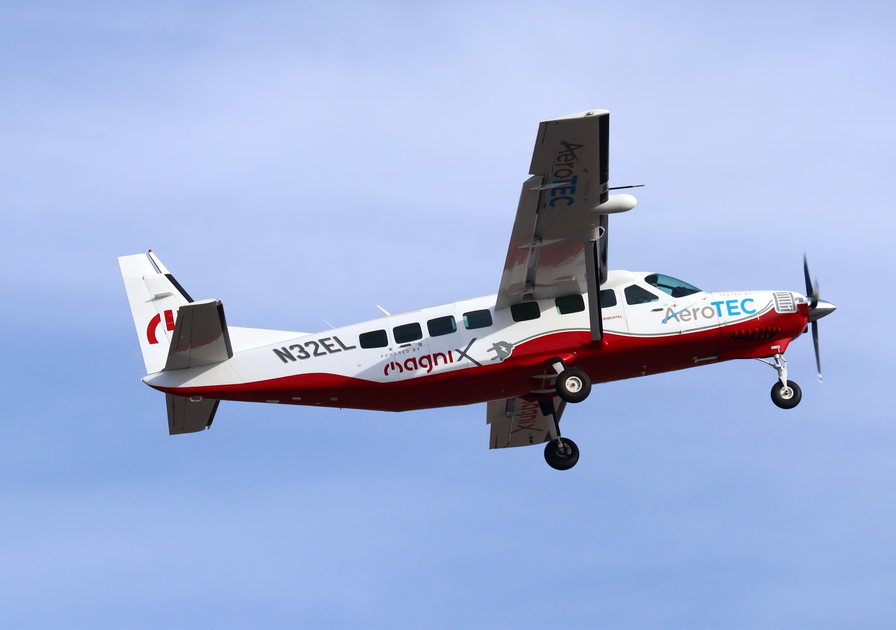 caption: A modified Cessna Grand Caravan takes off from Moses Lake, Washington, on its inaugural flight using fully-electric propulsion on Thursday..