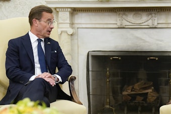 caption: President Biden (right) meets with Swedish Prime Minister Ulf Kristersson in the Oval Office on July 5, 2023, in Washington. Sweden has formally joined NATO as the 32nd member of the transatlantic military alliance.