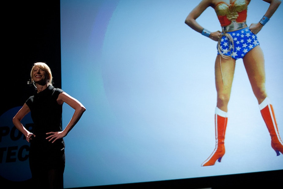 caption: Amy Cuddy speaks on how changing posture and pose can biologically imbue a person with power and confidence at PopTech 2011.