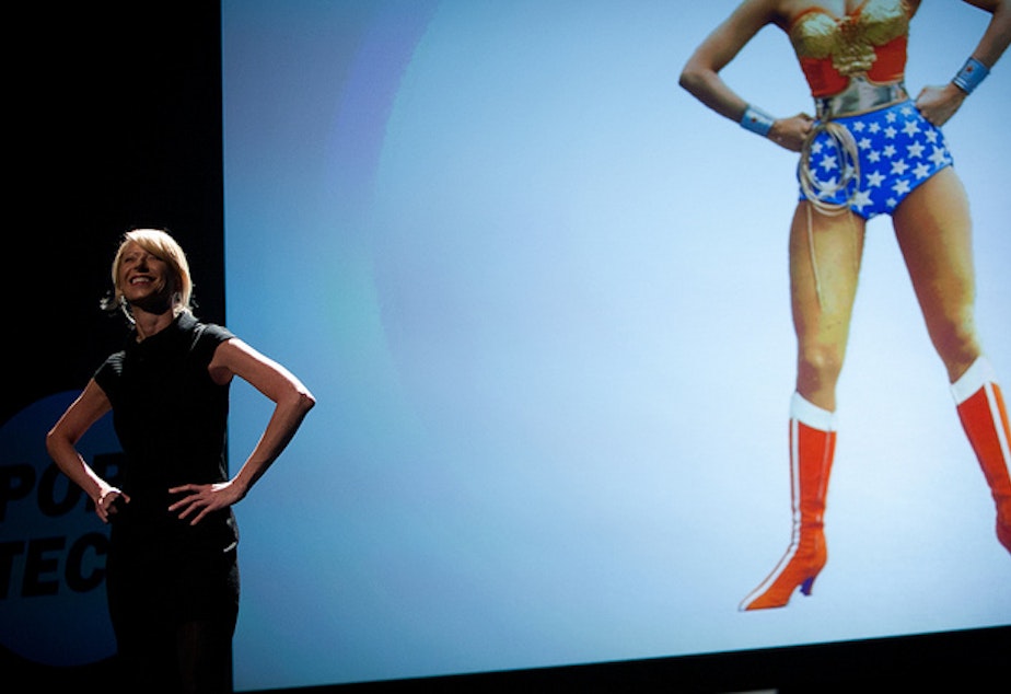 caption: Amy Cuddy speaks on how changing posture and pose can biologically imbue a person with power and confidence at PopTech 2011.
