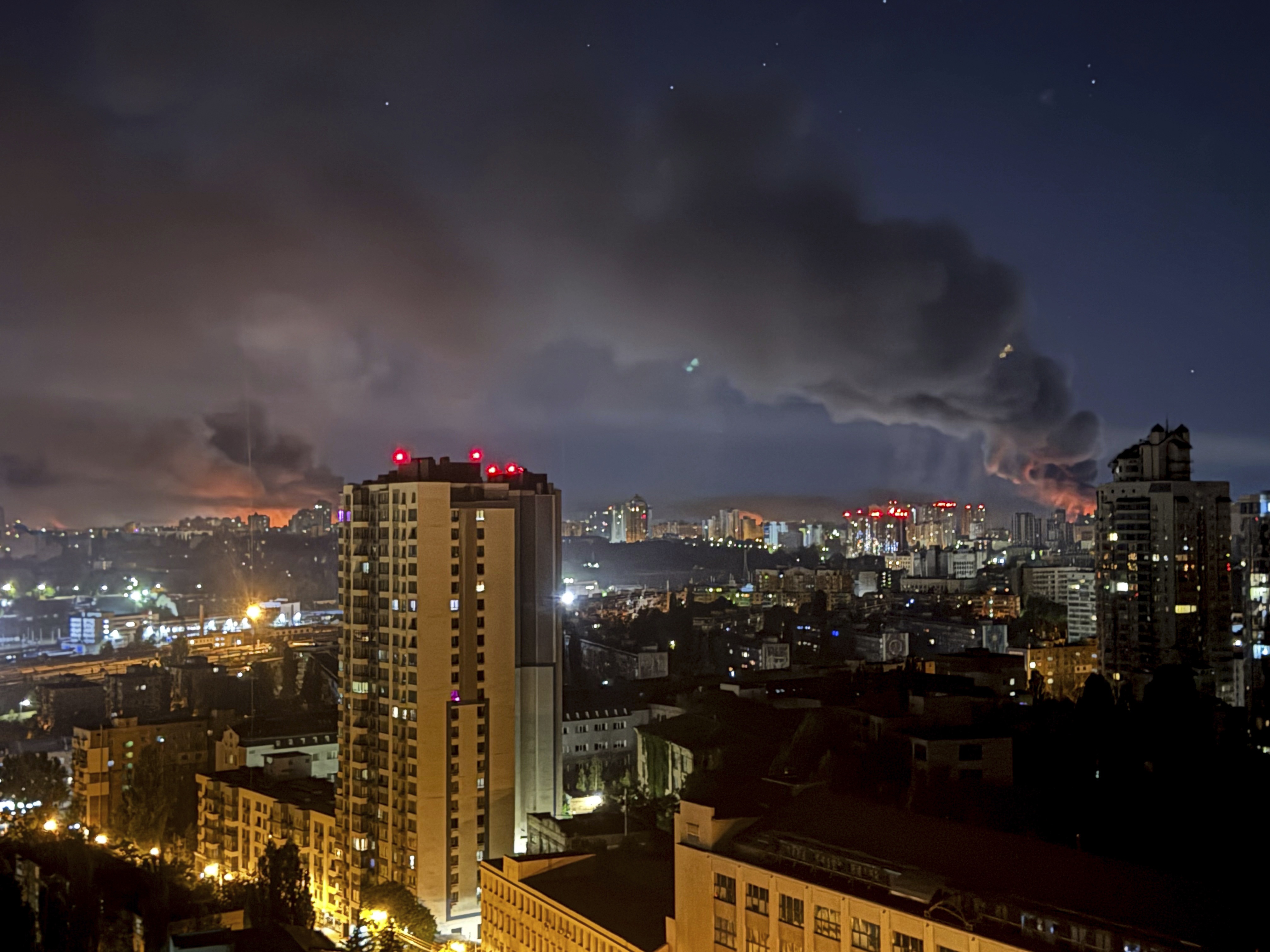 caption: Smoke rises after a Russian strike on Kyiv, Ukraine, Friday, July 4, 2025