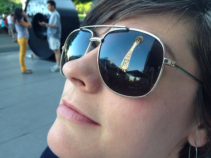 caption: Seattle gets more clouds than blue sky, so do we really buy that many sunglasses?