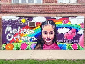 caption: A mural of Melissa Ortega, an 8-year-old victim of gun violence in Chicago, painted by artist Milton Coronado.