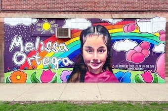 caption: A mural of Melissa Ortega, an 8-year-old victim of gun violence in Chicago, painted by artist Milton Coronado.