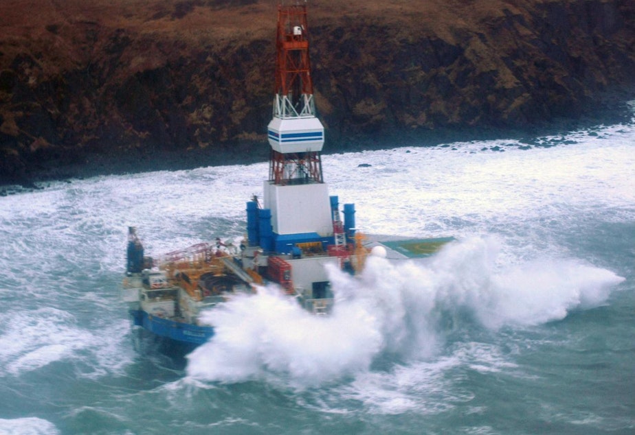 caption: Shell Oil's Kulluk drill rig, hard aground off Alaska's Sitkalidak Island in January 2013.