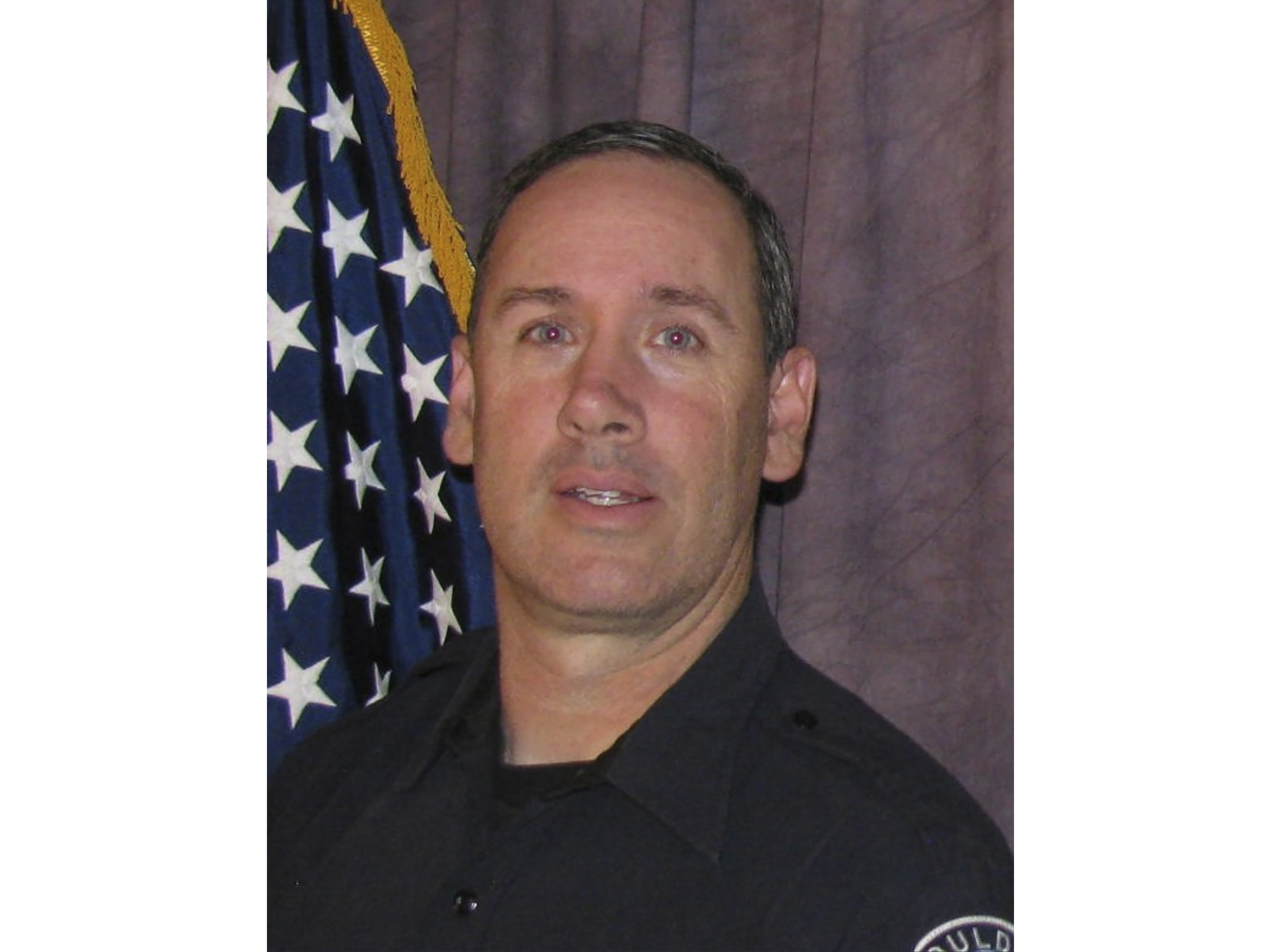 caption: Boulder Police Officer Eric Talley, who was killed along with nine other people in a mass shooting at a grocery store in Boulder, Colo., Monday.