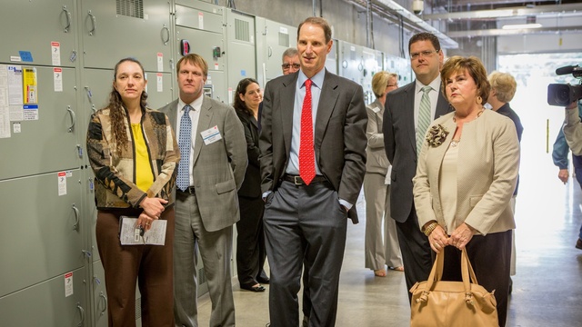 caption: U.S. Sen. Ron Wyden, D-Ore., (center) tours PGE's Smart Power Center in Salem, Ore. Wyden and other Northwest Democratic senators plan to take part in an all-night climate change talkathon on the U.S. Senate floor.