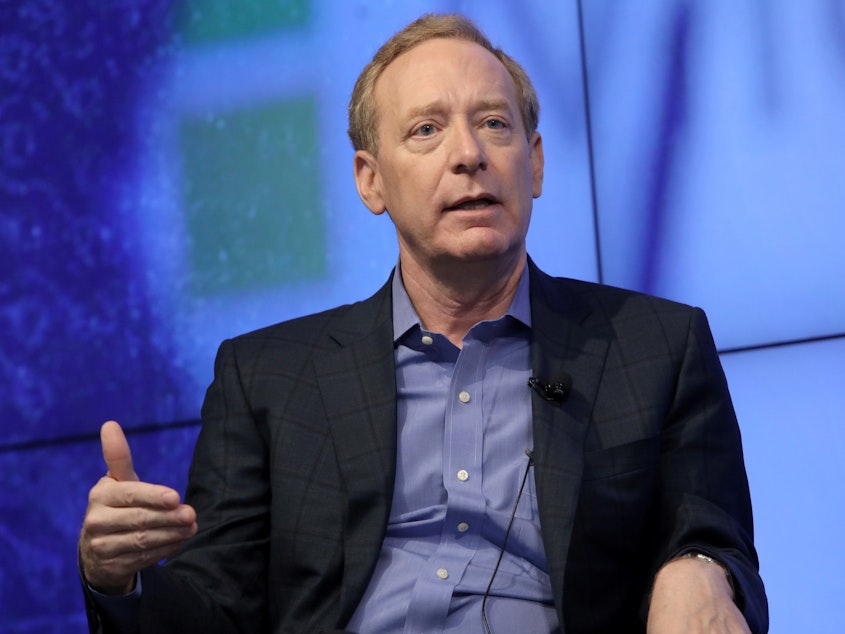 caption: Microsoft President Brad Smith says governments need to set rules for big technology companies. "Almost no technology has gone so entirely unregulated, for so long, as digital technology," he says.
