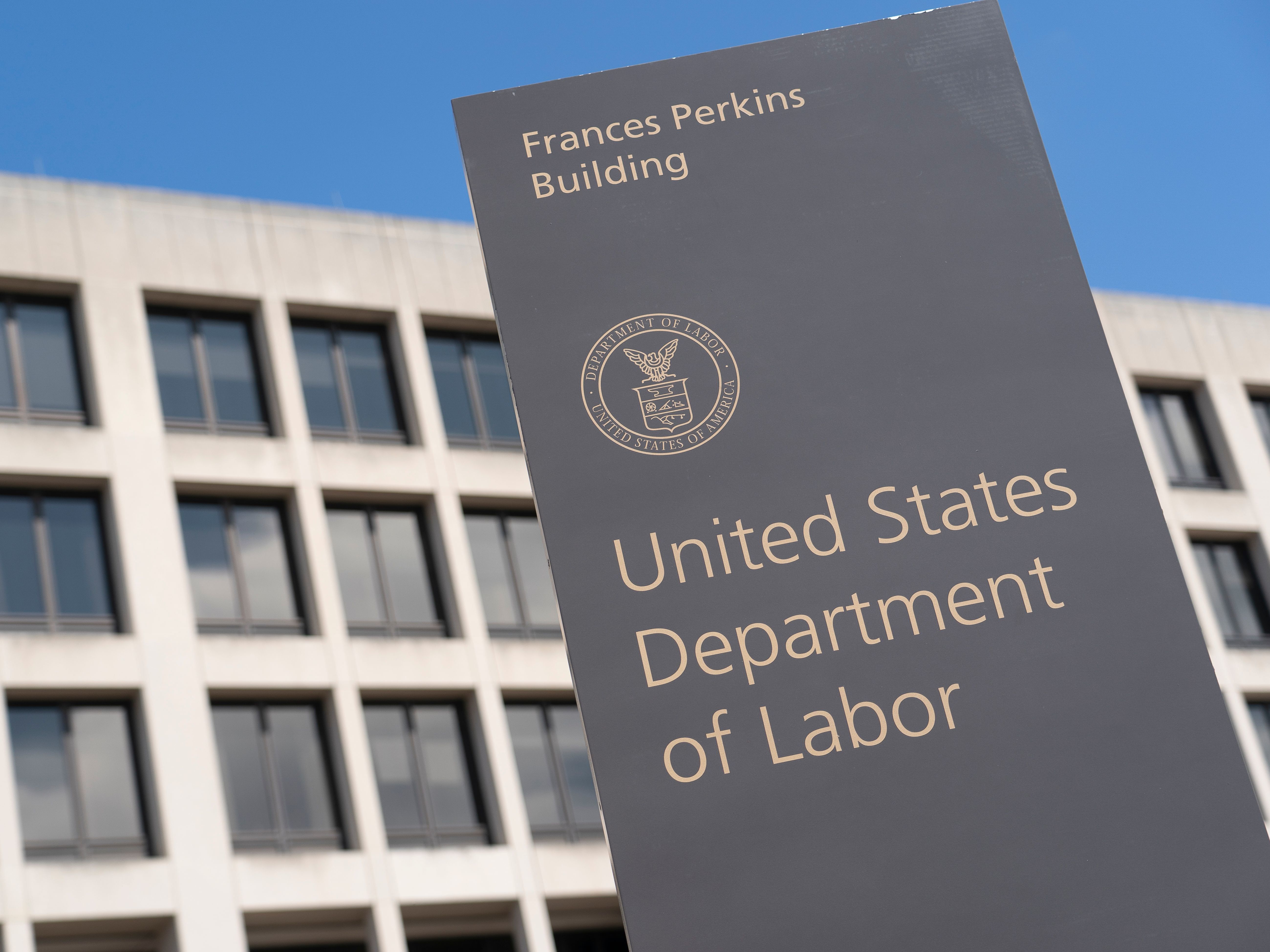 caption: The U.S. Department of Labor building on March 26, 2020, in Washington, D.C.