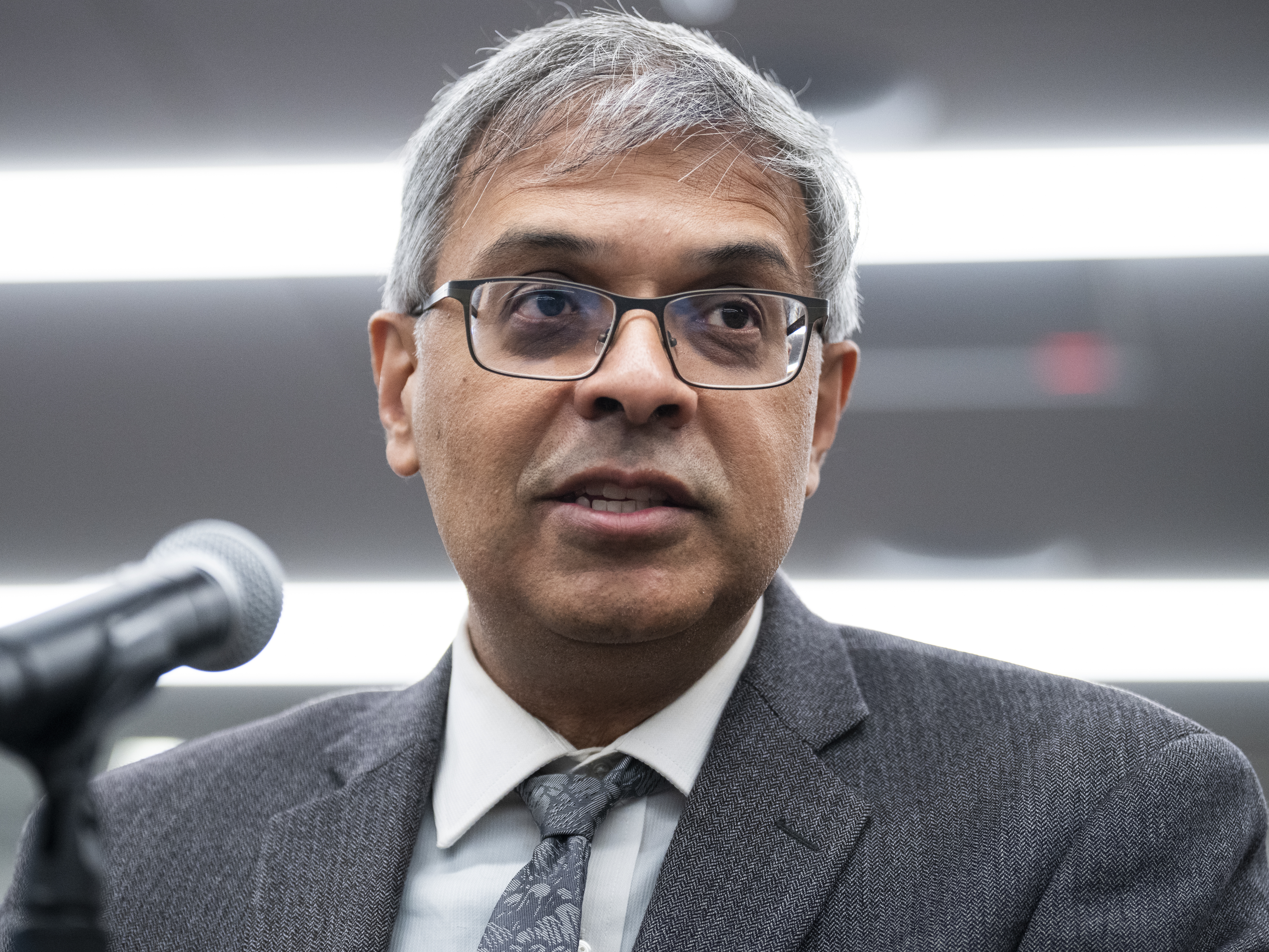 caption: Dr. Jay Bhattacharya speaks during a roundtable discussion with members of the House Freedom Caucus on the COVID-19 pandemic at The Heritage Foundation in late 2022.